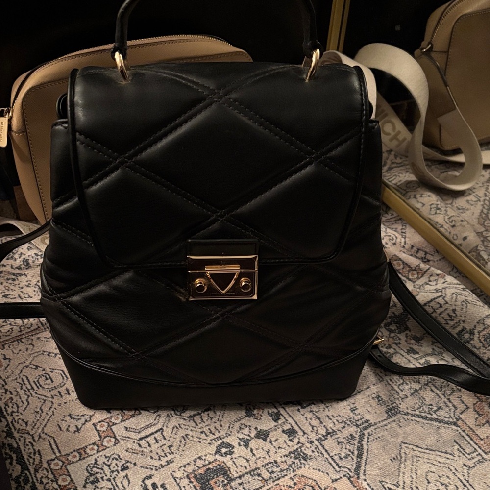 Michael Kors Black Quilted backpack with Gold Accents
